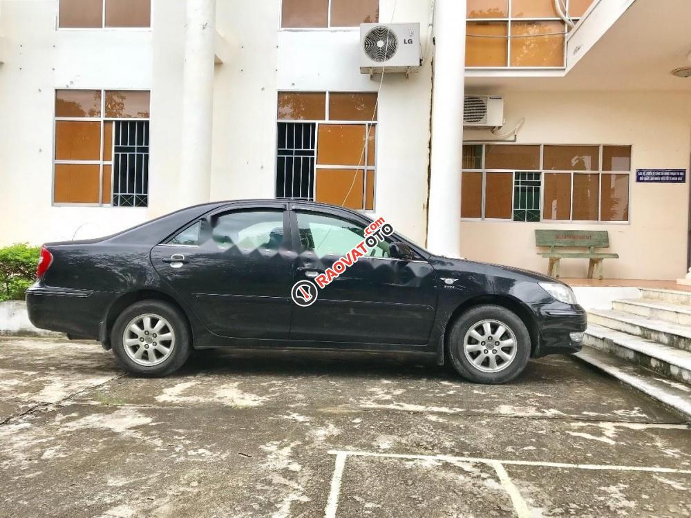 Cần bán gấp Toyota Camry sản xuất 2004, màu đen chính chủ-1