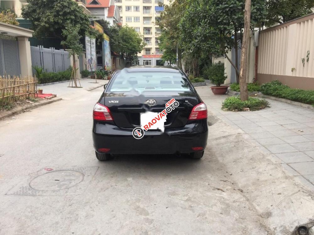 Cần bán xe Toyota Vios 1.5E đời 2012, màu đen xe gia đình-2