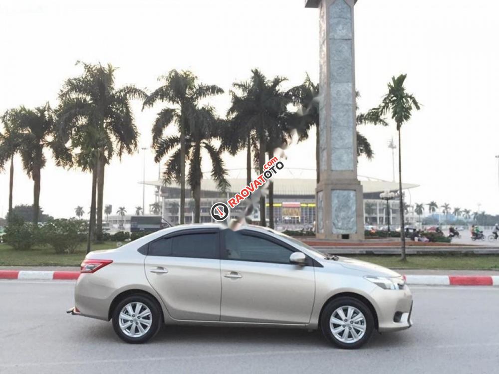 Bán ô tô Toyota Vios E 2017, màu vàng-3