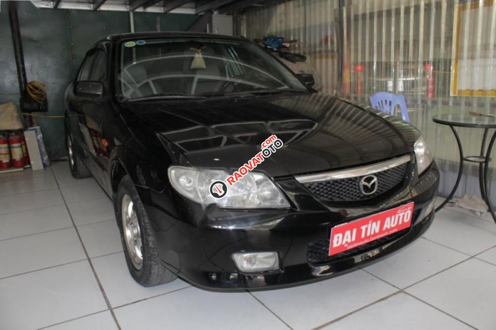 Cần bán gấp Mazda 323 đời 2003, màu đen chính chủ-1