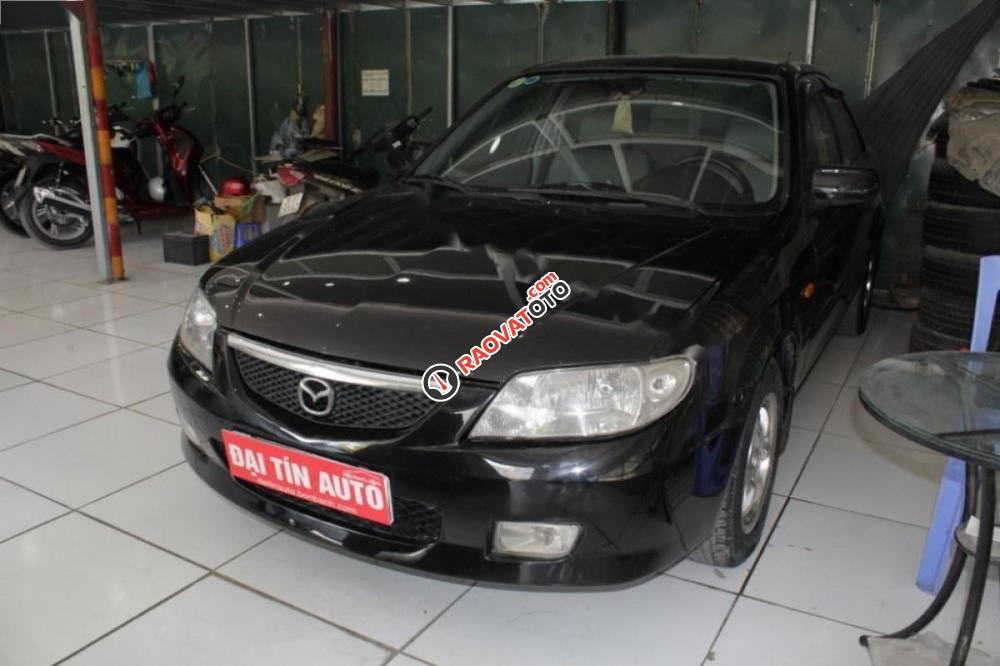 Cần bán gấp Mazda 323 đời 2003, màu đen chính chủ-0