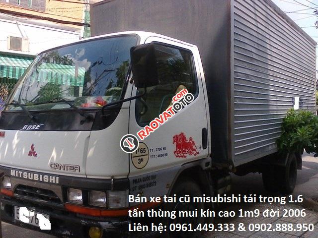 Cần bán gấp xe tải cũ Mitsubishi, tải trọng 1t6 thùng cao 1m9 đời 2006-0