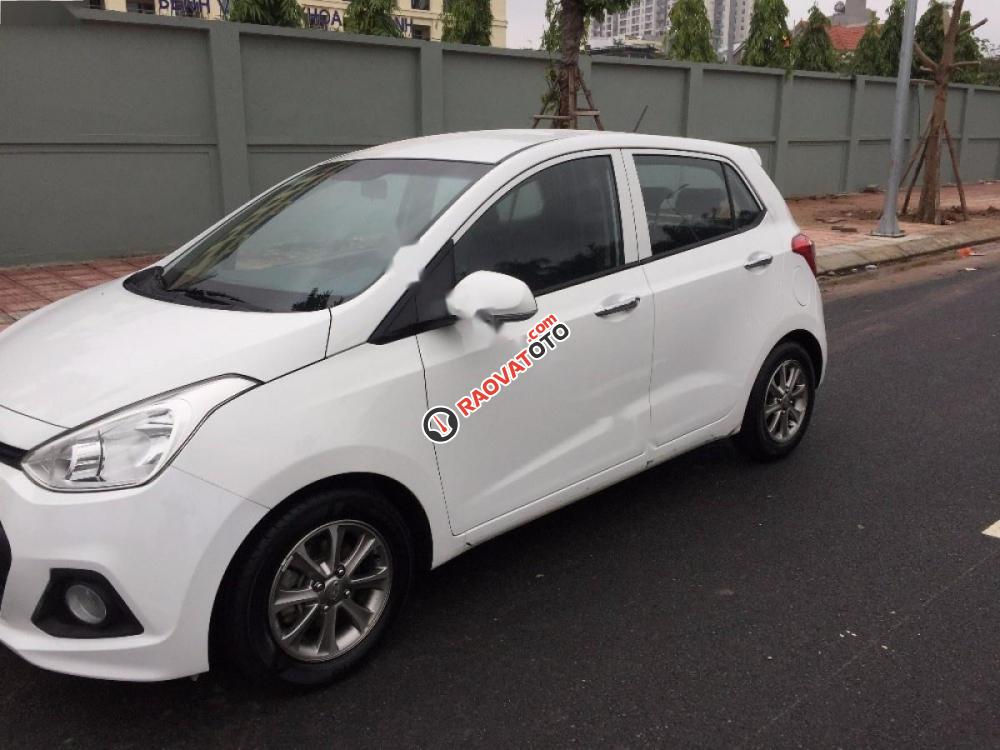 Bán Hyundai Grand i10 1.0 MT đời 2015, màu trắng, xe nhập số sàn, 338tr-2