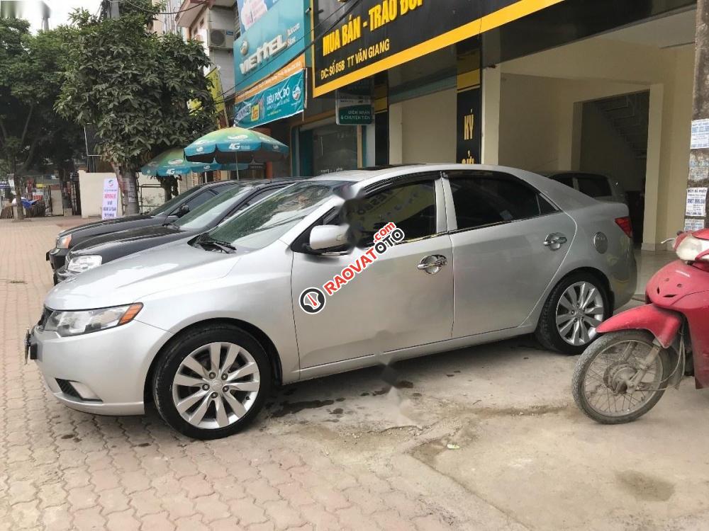 Cần bán gấp Kia Forte SLI đời 2010, màu bạc, xe nhập chính chủ, giá 385tr-0