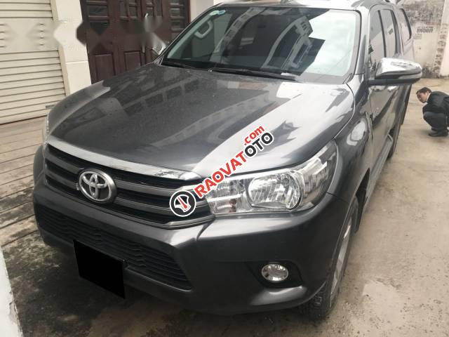 Cần bán gấp Toyota Hilux 2.5MT đời 2016, màu xám, nhập khẩu nguyên chiếc, giá 595tr-4