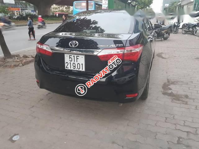 Cần bán Toyota Corolla altis 1.8GAT năm 2015, màu đen, giá chỉ 675 triệu-1