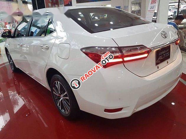 Bán Toyota Corolla altis 1.8E đời 2017, màu trắng -4