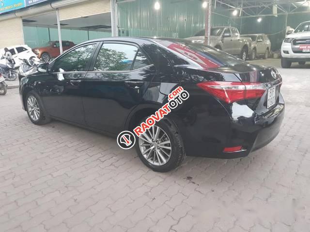 Cần bán Toyota Corolla altis 1.8GAT năm 2015, màu đen, giá chỉ 675 triệu-2