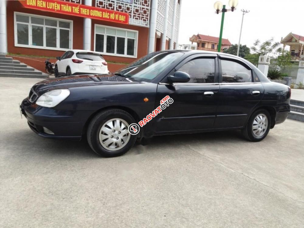 Cần bán Daewoo Nubira IIS sản xuất 2002, màu xanh lam chính chủ-3