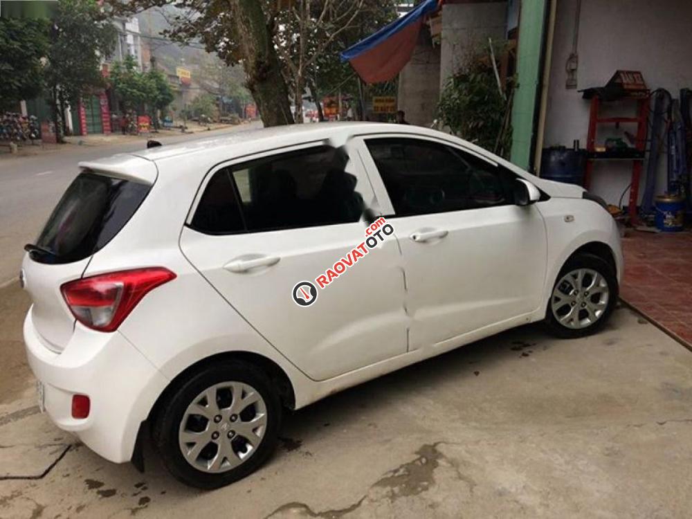 Cần bán gấp Hyundai Grand i10 1.0 MT Base đời 2014, màu trắng, nhập khẩu nguyên chiếc-1