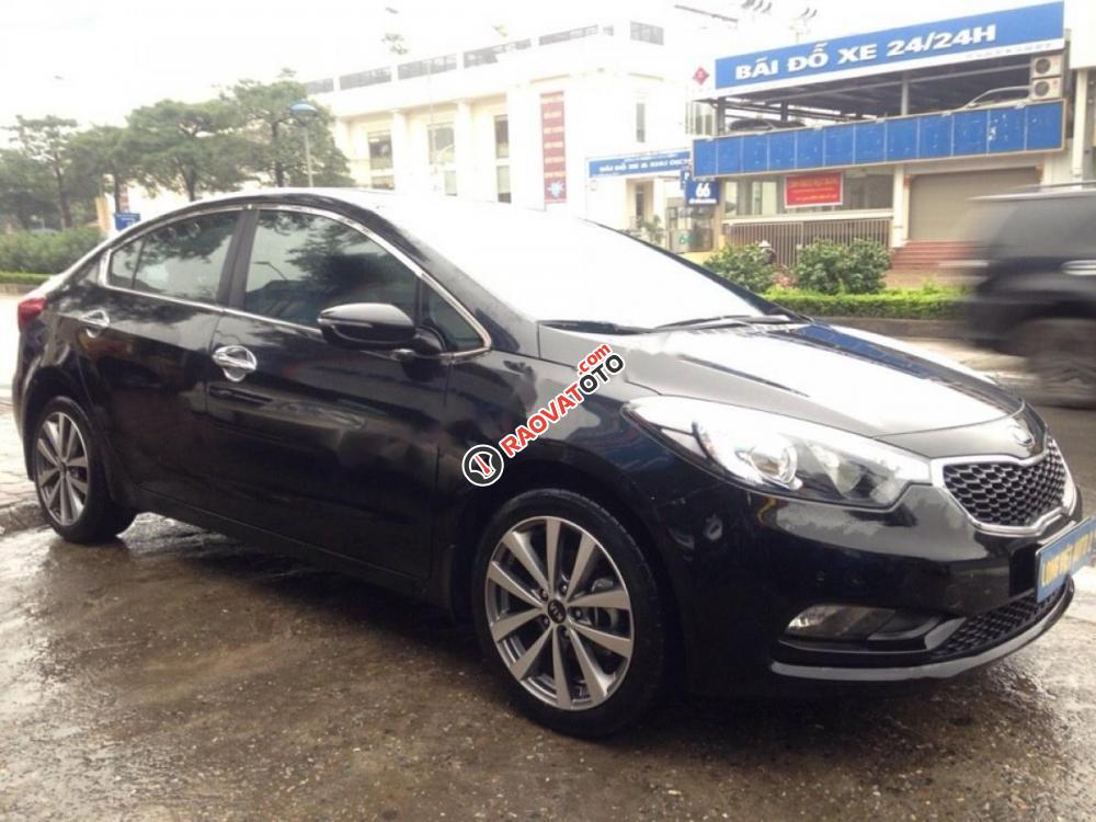 Cần bán xe Kia K3 1.6AT đời 2015, màu đen chính chủ, 550tr-1