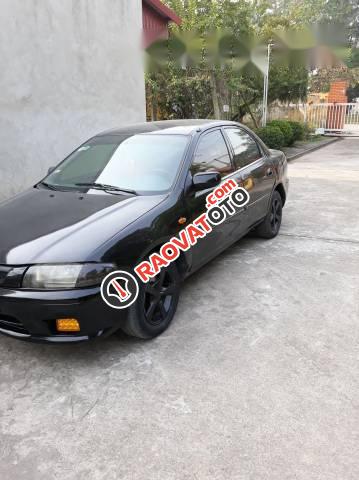 Cần bán gấp Mazda 323 đời 1997, màu đen, giá tốt-0