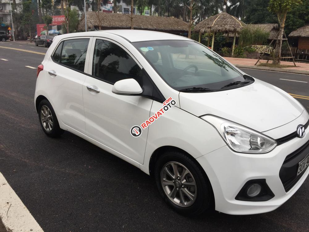 Cần bán gấp Hyundai Grand i10 2015, màu trắng, xe nhập số sàn-1