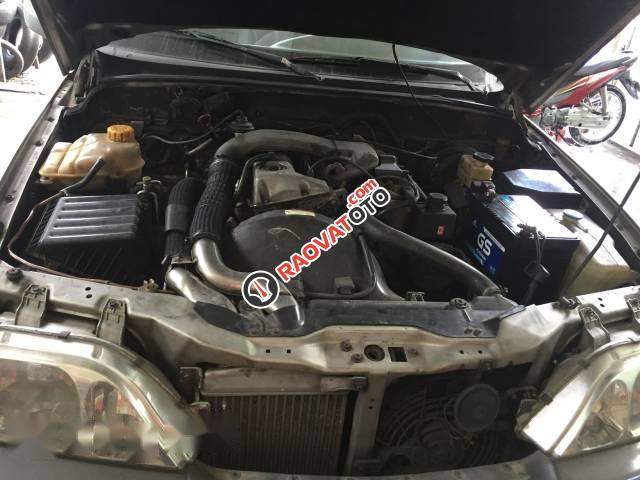 Cần bán Ssangyong Musso năm 2004, màu bạc-1