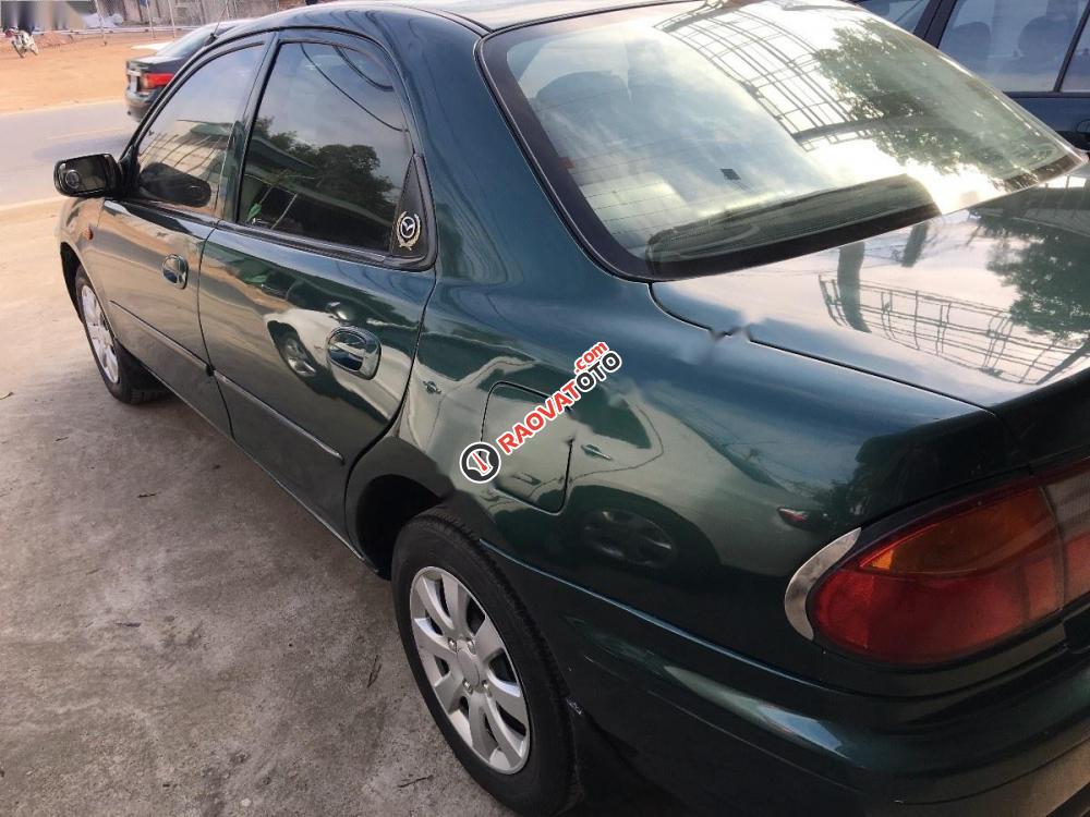 Bán xe Mazda 323 1.6 MT đời 1999, màu xanh lam, 115tr-4