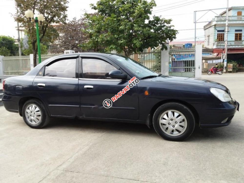 Cần bán Daewoo Nubira IIS sản xuất 2002, màu xanh lam chính chủ-4