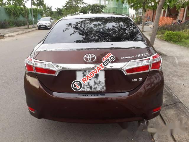 Bán Toyota Corolla Altis đời 2015, màu nâu xe gia đình-1