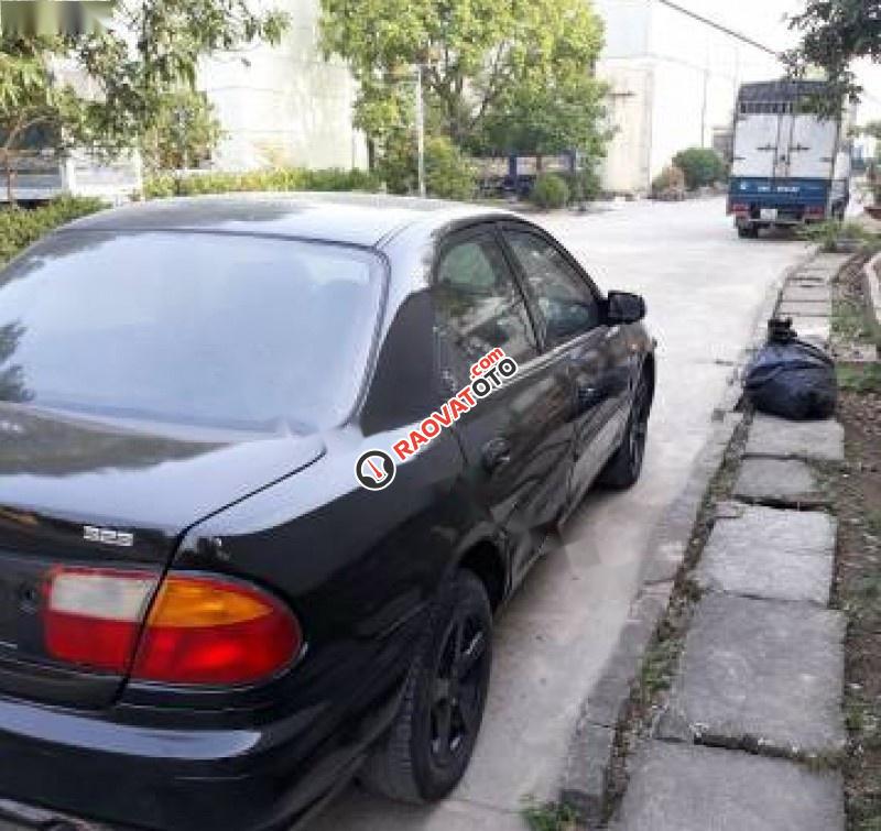 Cần bán Mazda 323 1.6 MT đời 1997, màu đen-0