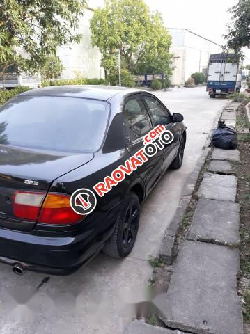 Cần bán gấp Mazda 323 đời 1997, màu đen, giá tốt-1