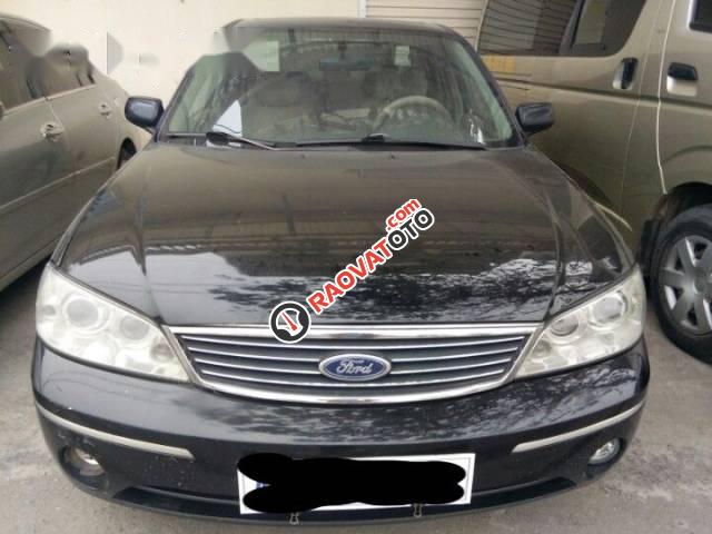 Bán Ford Laser 1.8AT năm 2004, màu đen, giá chỉ 218 triệu-0