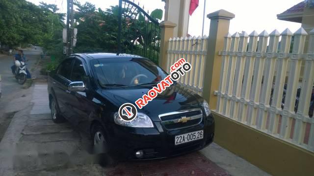 Cần bán Chevrolet Aveo đời 2011, màu đen xe gia đình-0