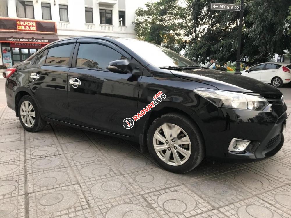 Bán Toyota Vios 1.5E đời 2014, màu đen số tự động-2