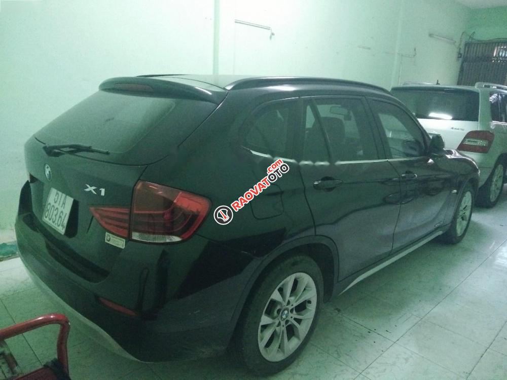 Bán ô tô BMW X1 xDrive28i đời 2011, màu đen, nhập khẩu nguyên chiếc ít sử dụng, 630tr-0