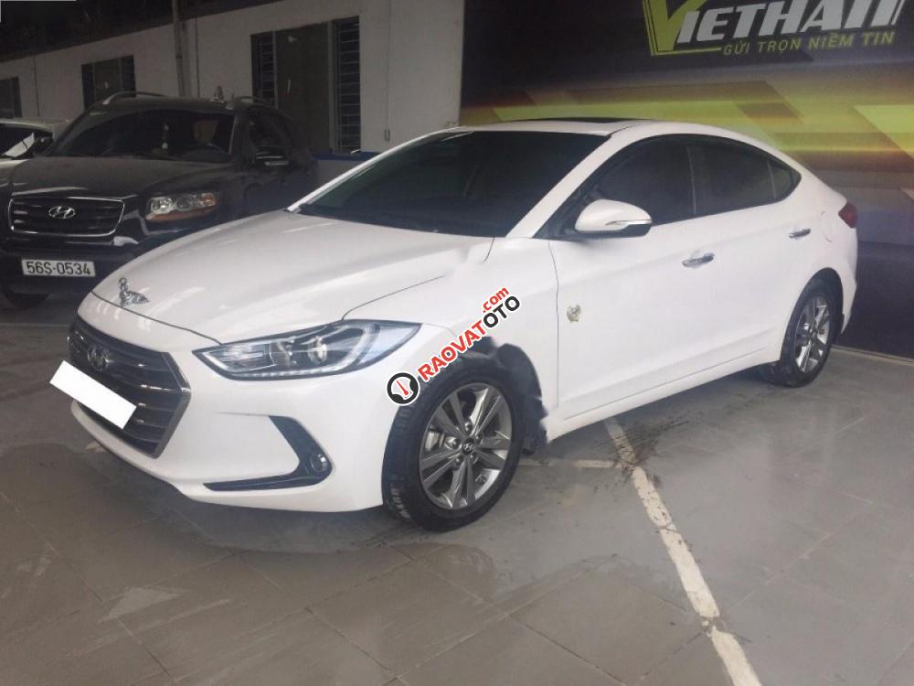 Bán ô tô Hyundai Elantra 1.6AT đời 2016, màu trắng xe gia đình-9