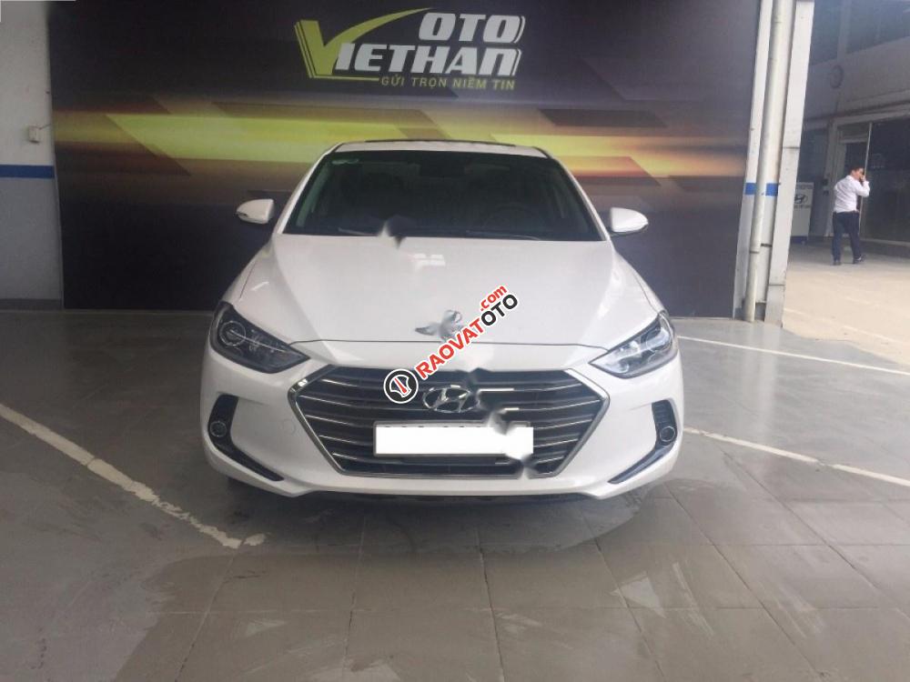 Bán ô tô Hyundai Elantra 1.6AT đời 2016, màu trắng xe gia đình-8