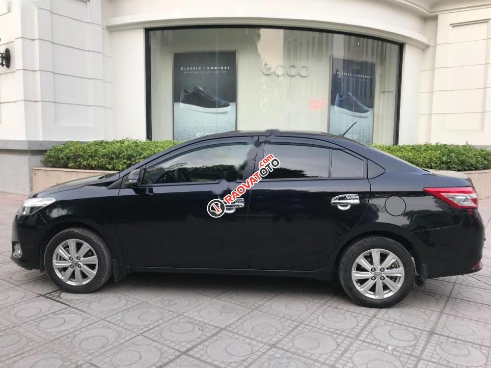 Bán Toyota Vios 1.5E đời 2014, màu đen số tự động-1