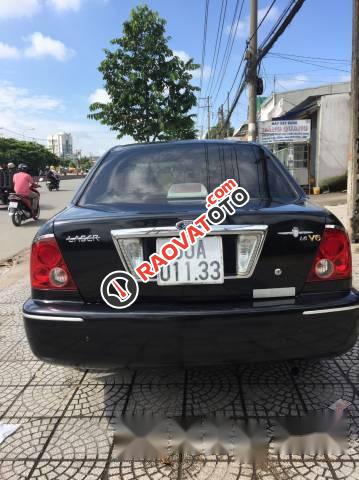 Bán ô tô Ford Laser Ghia 1.8 đời 2003, màu đen -1