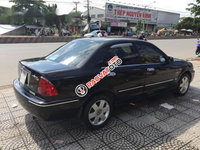 Bán ô tô Ford Laser Ghia 1.8 đời 2003, màu đen -2