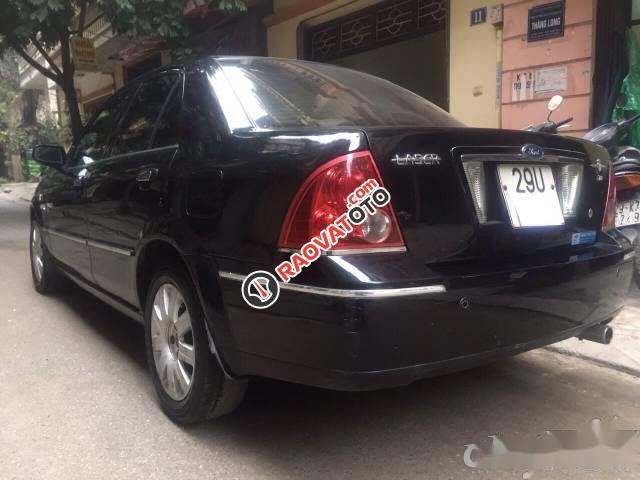 Cần bán lại xe Ford Laser Ghia 1.8 sản xuất 2004, màu đen số tự động-1