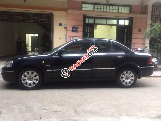 Cần bán lại xe Ford Laser Ghia 1.8 sản xuất 2004, màu đen số tự động-4