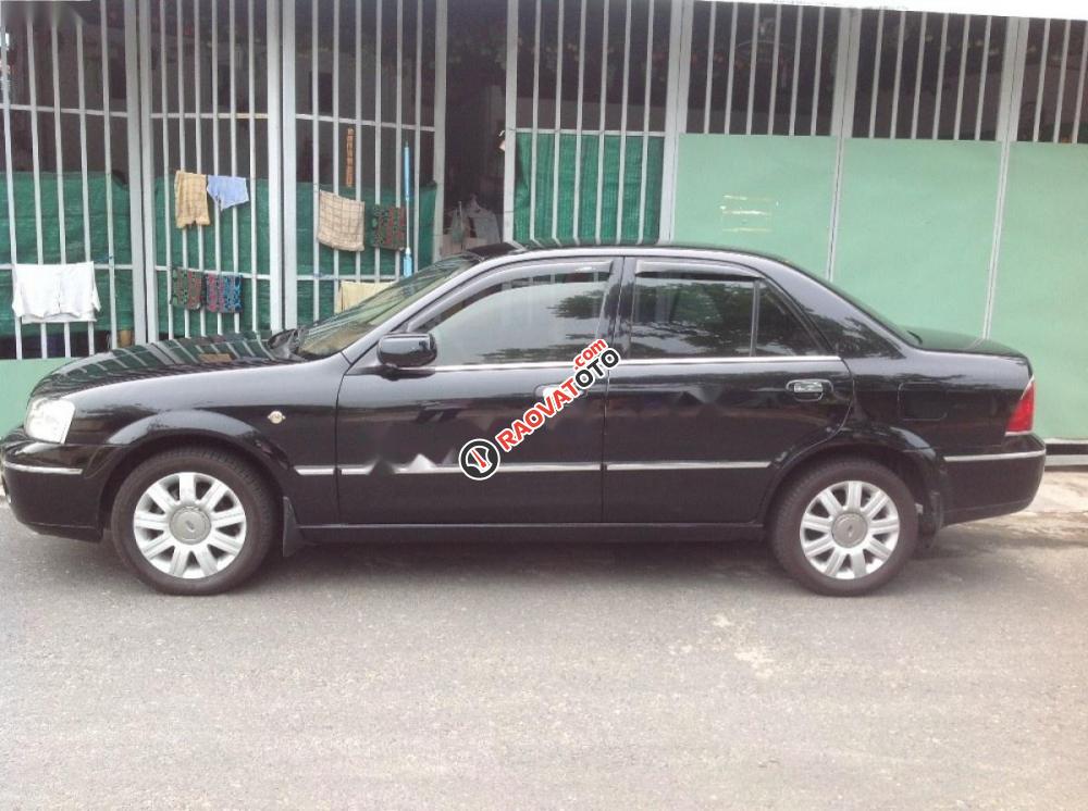 Bán Ford Laser Ghia 1.8 năm 2004, màu đen số sàn-4