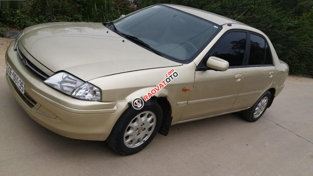 Cần bán xe Ford Laser Delu năm 2001, màu vàng-5