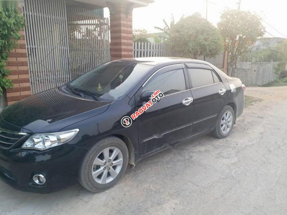 Cần bán gấp Toyota Corolla Altis 1.8MT đời 2011, màu đen chính chủ, giá tốt-0