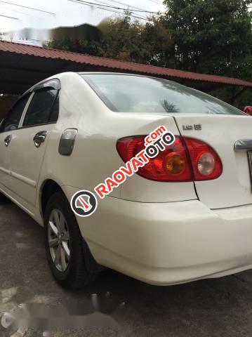 Bán Toyota Corolla J đời 2002, màu trắng số sàn, giá 190tr-1