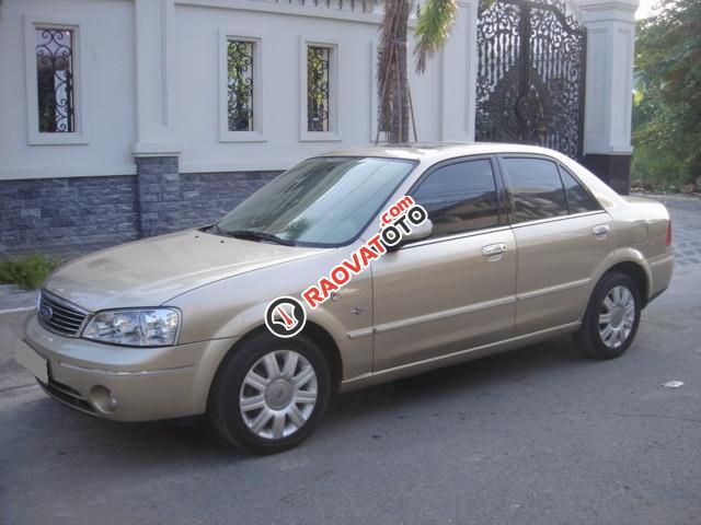 Nhà cần bán Ford laser 2005 AT 1.8 sunrup mui, màu vàng, xe rất mới-5