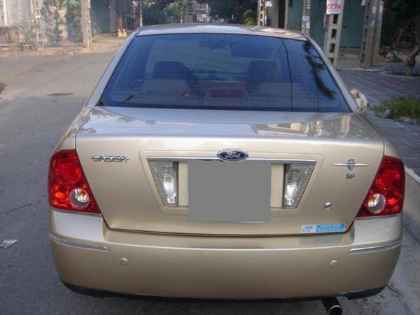 Cần bán gấp Ford Laser 1.8AT năm 2005, màu vàng-0