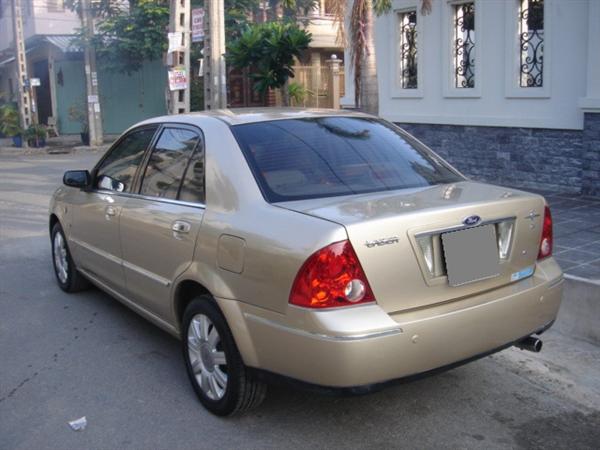 Cần bán gấp Ford Laser 1.8AT năm 2005, màu vàng-4