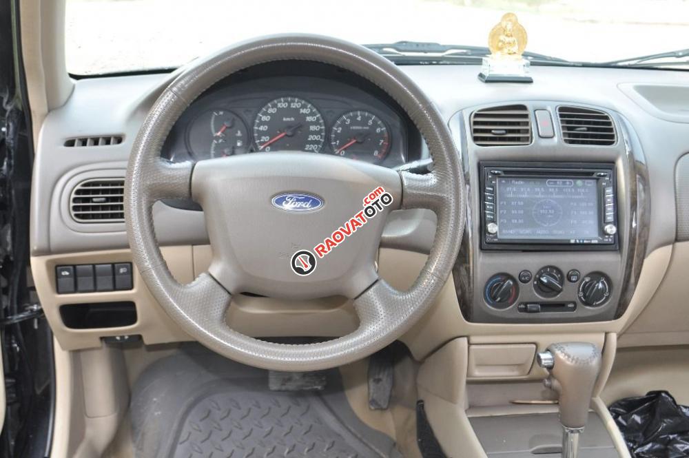 Nhà cần bán Ford laser 2005 AT 1.8 sunrup mui, màu vàng, xe rất mới-0