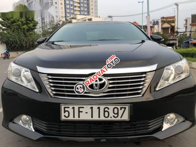 Cần bán lại xe Toyota Camry 2.0 sản xuất 2014, màu đen số tự động-0