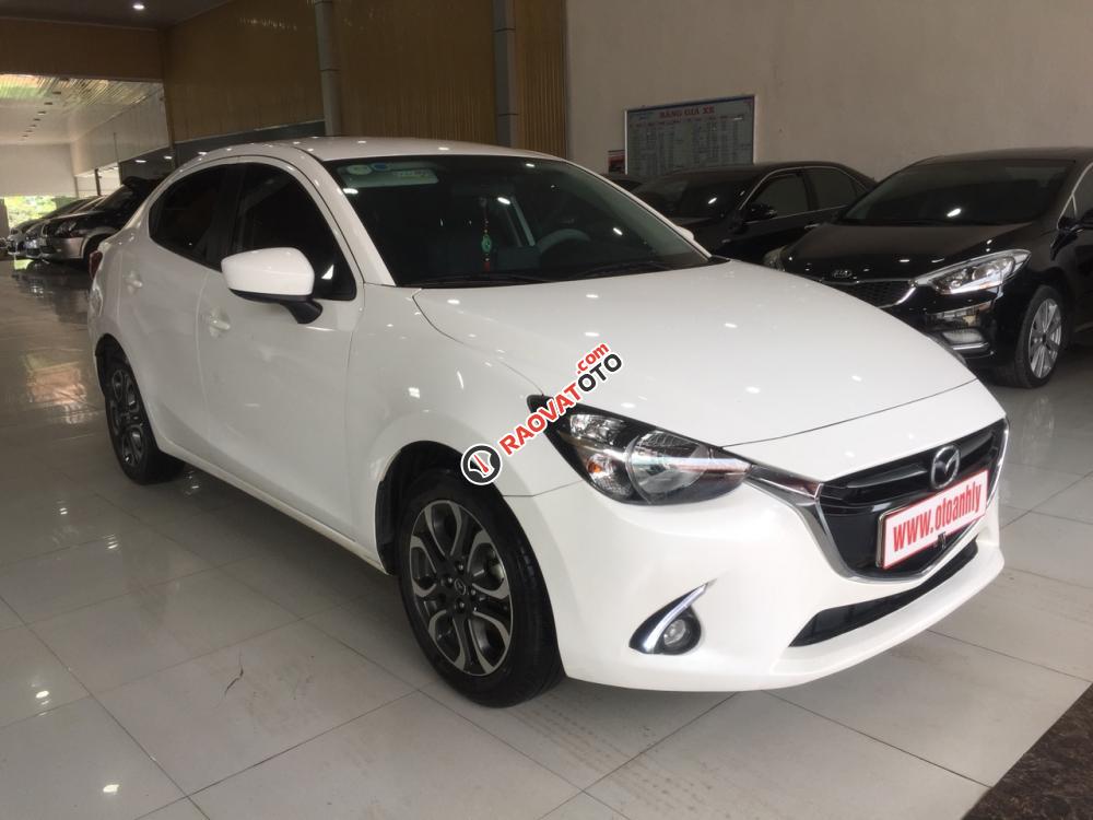 Cần bán xe Mazda 2 1.5, sản xuất năm 2016, màu trắng, giá tốt-0