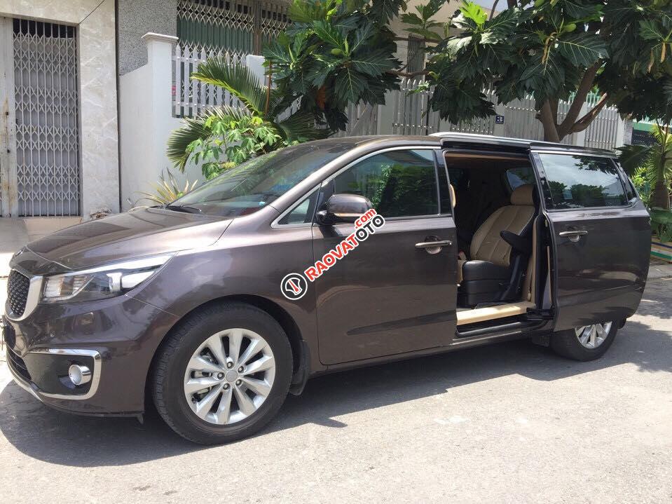 Bán Kia Sedona nâu hột nhãn 2015 bản tự động 3.3 full option mới zin-0