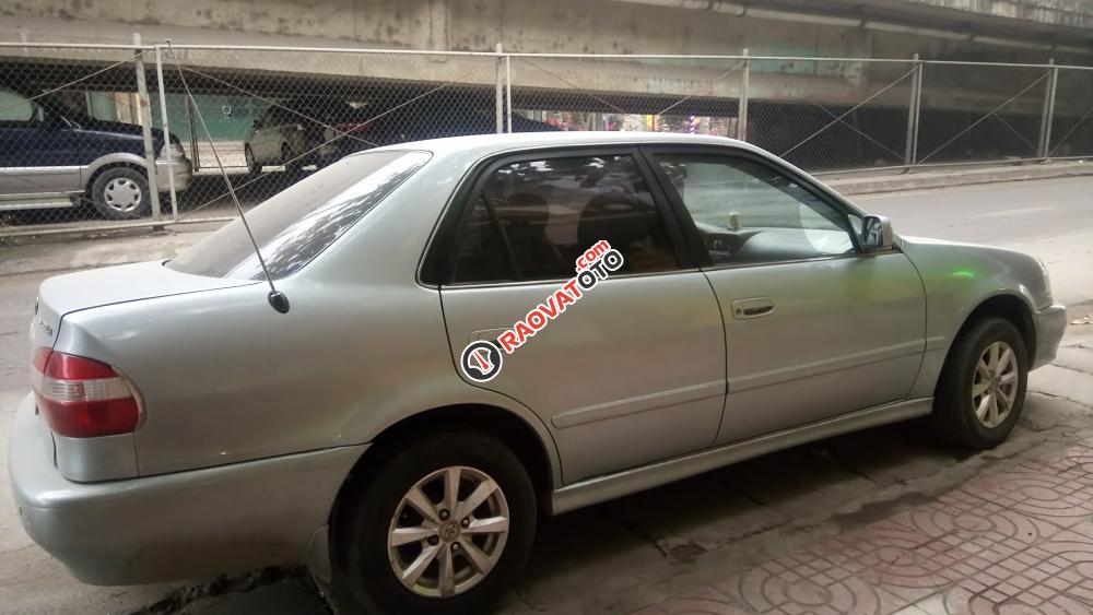 Cần bán Toyota Corolla 1.6 GLi đời 2000, màu bạc, nhập khẩu nguyên chiếc chính chủ, giá tốt-1