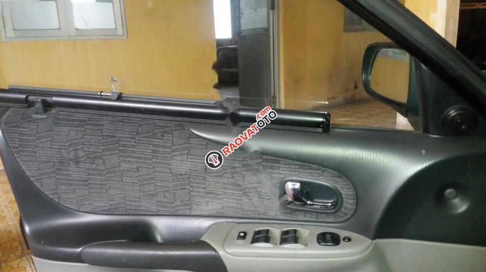 Cần bán xe Ford Laser GHIA sản xuất năm 2003, màu đen, 215 triệu-8