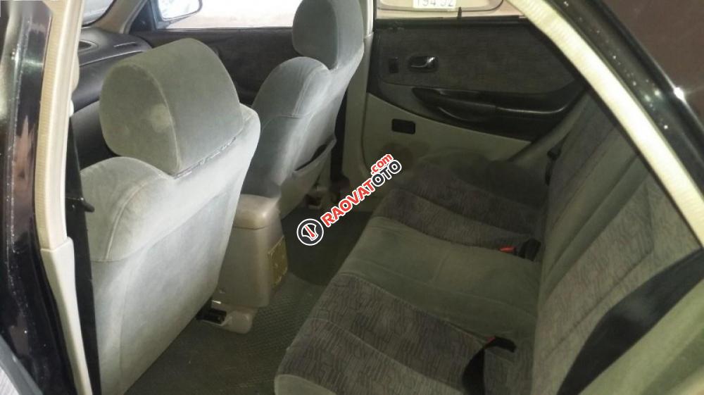 Cần bán xe Ford Laser GHIA sản xuất năm 2003, màu đen, 215 triệu-7