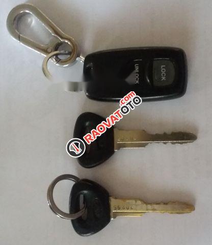 Chính chủ cần bán xe Ford Laser GHIA 1.8 sản xuất năm 2003, màu đen, giá cạnh tranh-0