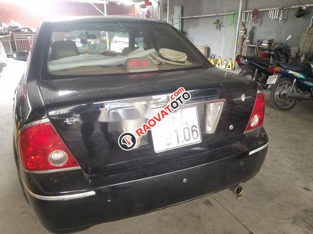 Cần bán gấp Ford Laser Ghia 1.8 sản xuất 2004, màu đen chính chủ-4